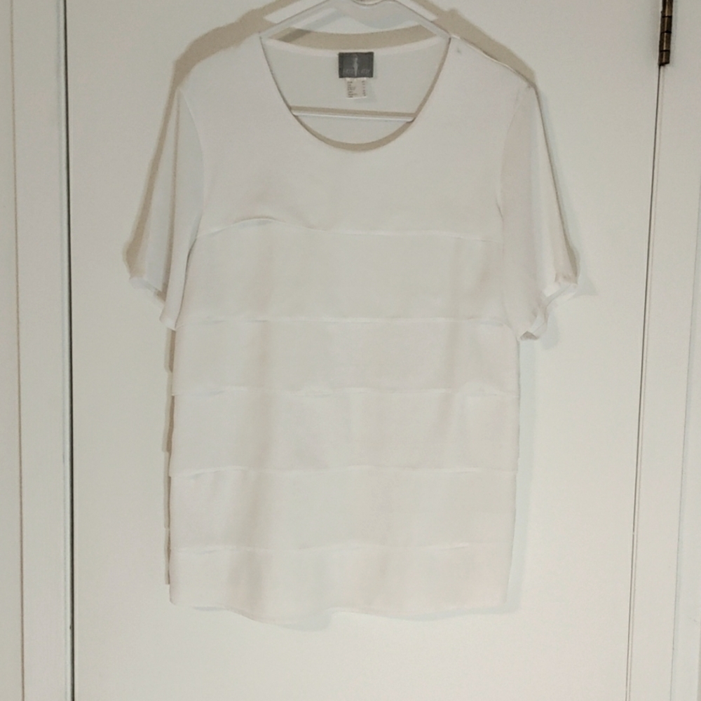 White pleated blouse